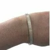 Pulsera de acero.